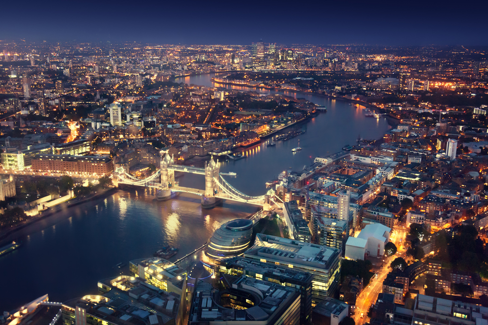 London at night with urban architectures and Tower Bridge